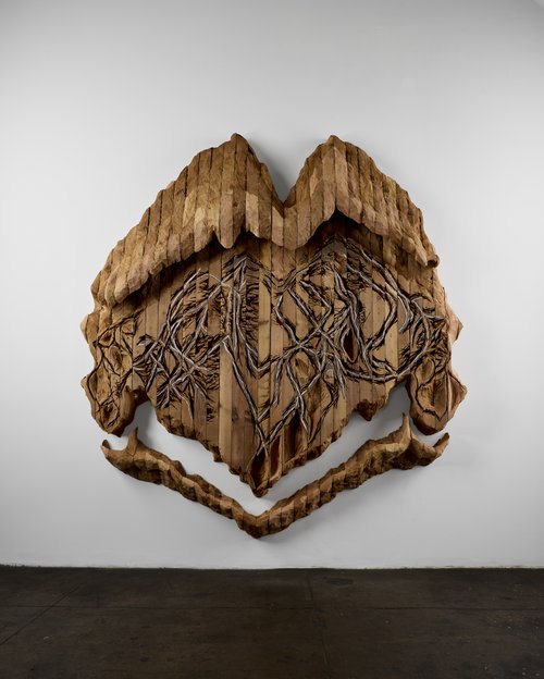 Ursula von Rydingsvard (American, b. Germany, 1942) DO CIAŁA, 2024 Cedar and graphite, 123 x 108 x 15 in. © Ursula von Rydingsvard, courtesy Galerie Lelong and Talley Dunn Gallery Photo by Joshua Simpson
