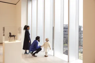 Family in sculpture gallery