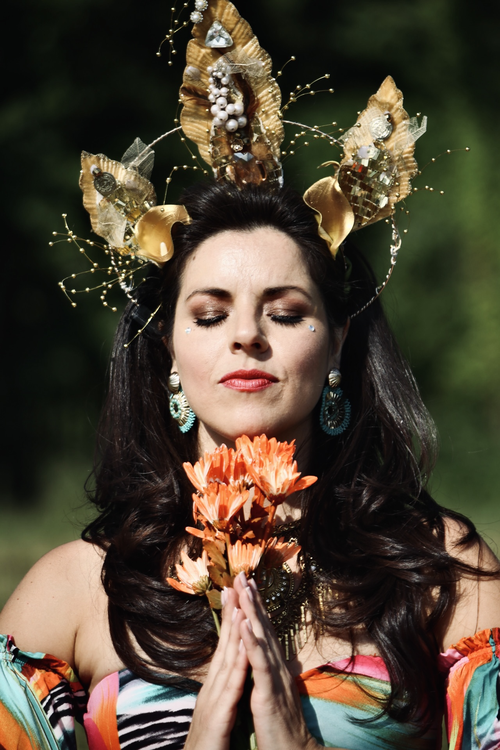 Shlomit Oren A multi-generational person-centered expressive arts therapist, somatic therapist, owner of Gleeful Wellness LLC, a multi-faceted artist, physical actress, dancer, and clown.