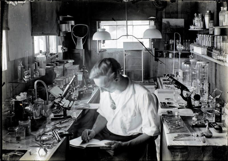 Paul Howes photographic self-portrait in his home laboratory, Stamford, CT in 1915.
